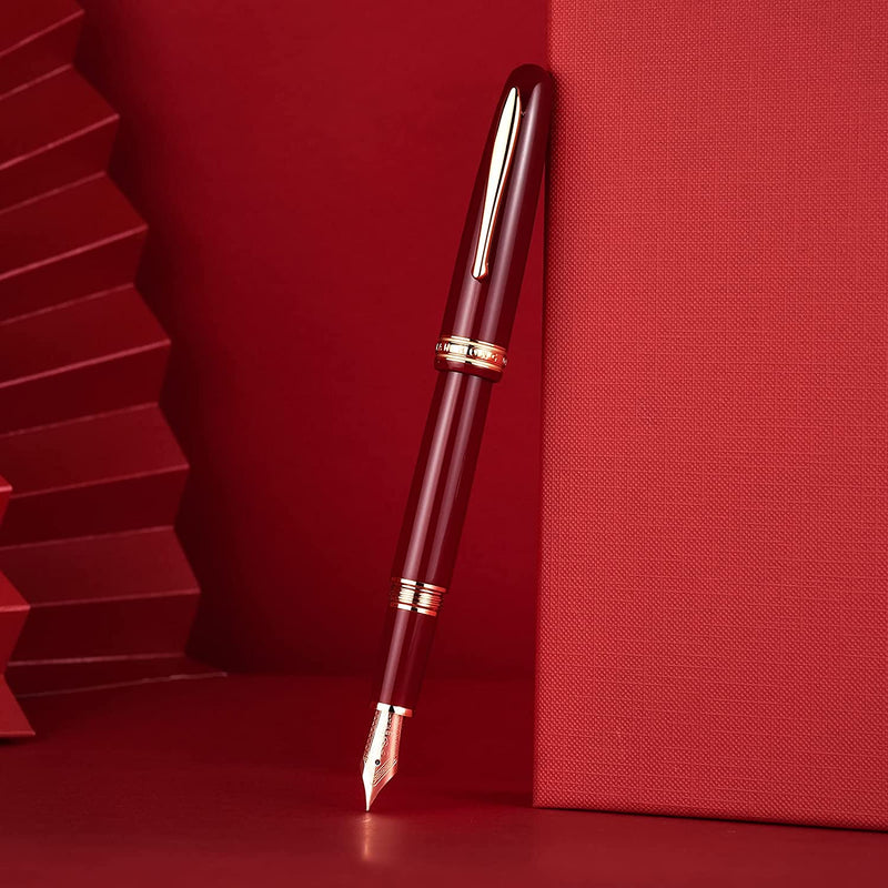 HONGDIAN 1841 Red Fountain Pen with Posted Cap Support on Red Colour Canvas with Horizontal Angle
