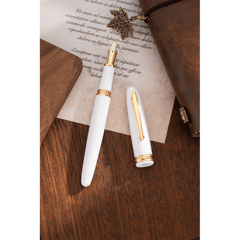 HONGDIAN 1841 White Fountain Pen Open Cap Display and Cap Beside Pen with Paper on Background