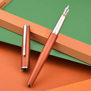 HONGDIAN 920 ORANGE Fountain Pen with Open Cap and Cap Beside Pen
