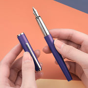HONGDIAN 920 VIOLET Fountain Pen Open Cap and Cap Beside Pen on Hand
